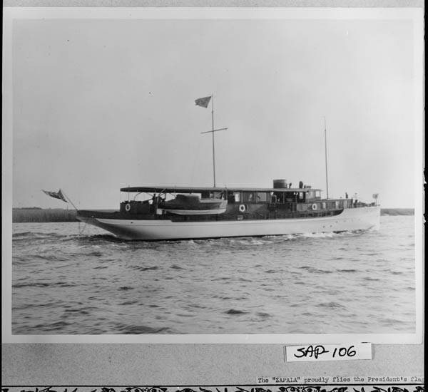The motor yacht Zapala sails with the Presidential party aboard. Note the President's flag is raised. 