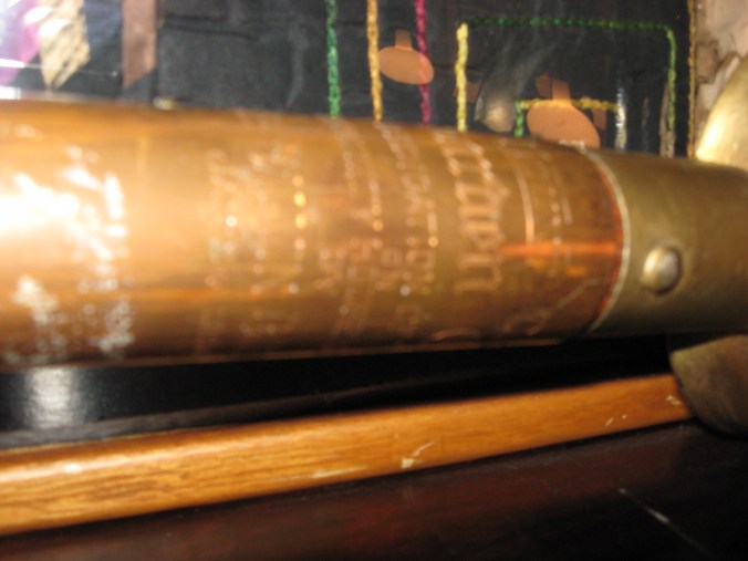 While the inscription is blurred, it was assumed that Calvin, not Grace, would dedicate the Community Building. As it turned out, he was out of town at the Orange Festival, while she planted the tree. Unfortunately, it did not last long being a variety of cypress that did not adapt well to the Florida climate. 