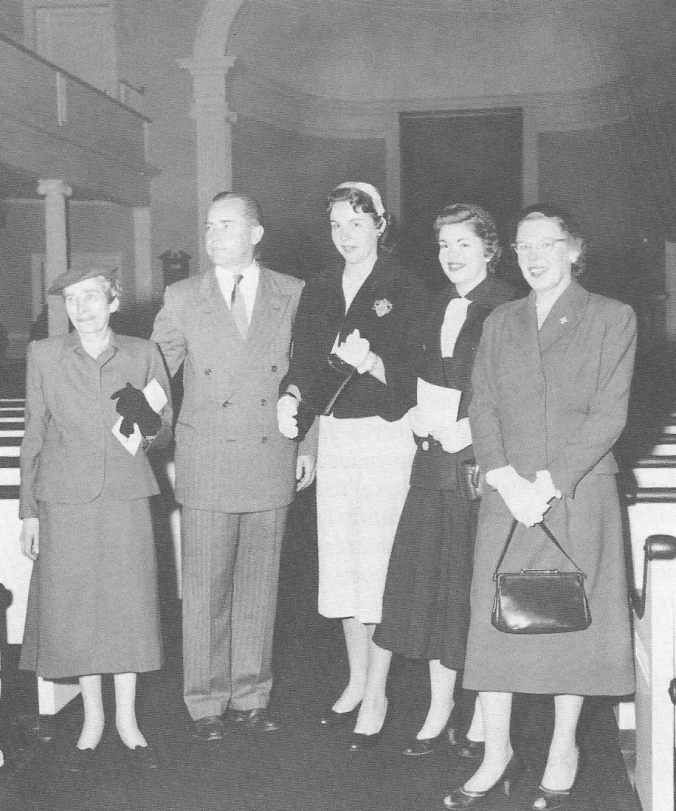 The Coolidge family at the dedication of the Calvin Coolidge Memorial Room in Forbes Library, September 1956. This would prove to be Grace's final public appearance. Her "Precious Four," as she called children John and Florence with granddaughters Cynthia and Lydia, are featured in Gloria May Stoddard's fine book, Grace and Cal: A Vermont Love Story, p.153). This photograph is found in the holdings of Forbes Library.