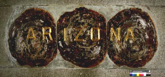 Composed of three petrified logs from the Chalcedony Forest in Holbrook, Arizona, the 2 x 4 foot stone rests oat the 320-foot level of the interior wall in the Washington Monument. 