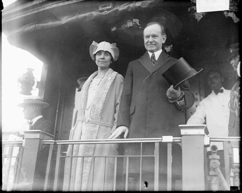 The Coolidges at the rear of their train