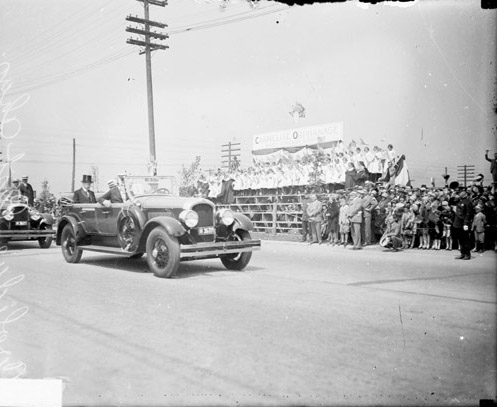 The children of the Carmelite Orphanage enthusiastically receive the Coolidges