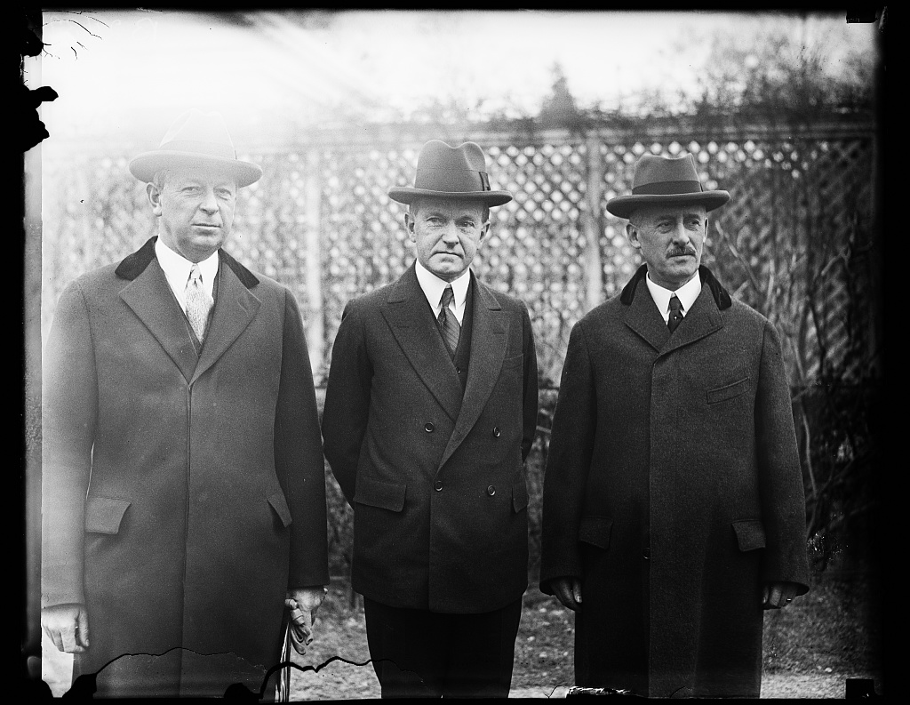 President Coolidge on the White House grounds with his Secretary of War, Dwight F. Davis, and his representative to Nicaragua and then the Philippines, Henry L. Stimson, circa early 1928.