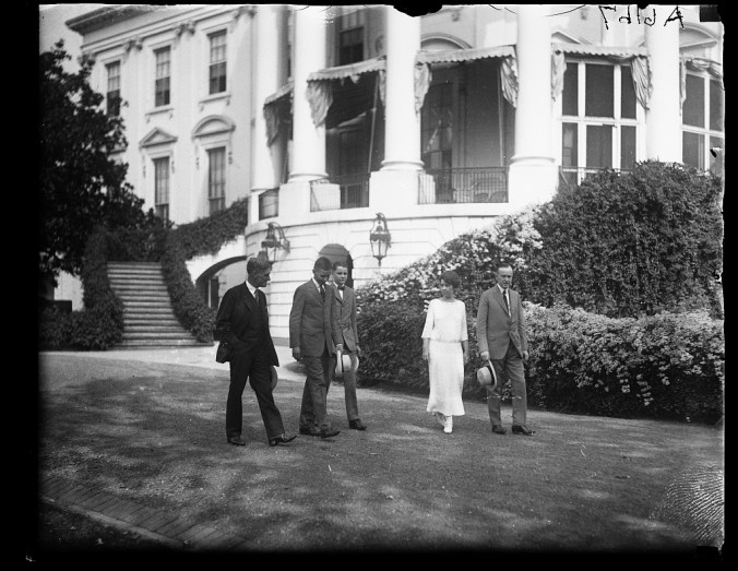 43355v Coolidges with Mr Christian