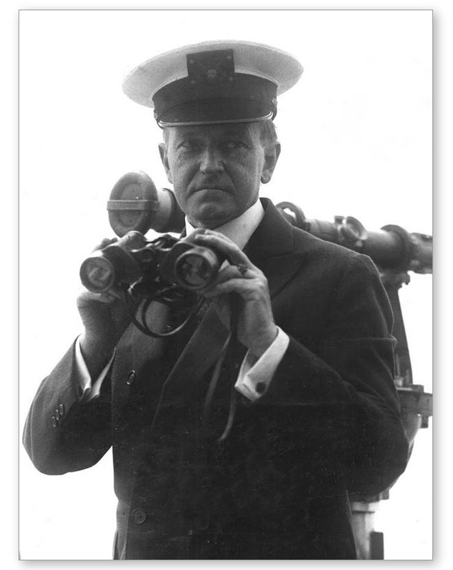 President Coolidge with his favorite cover aboard the Mayflower, 1925. 