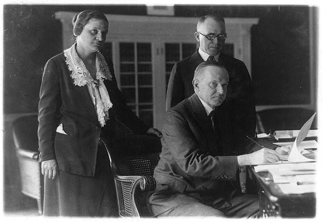 President Coolidge collaborating with Assistant Attorney General Mabel Willebrandt and Representative Israel M. Foster on child labor and education policy, June 7, 1924. Courtesy of the Library of Congress. 