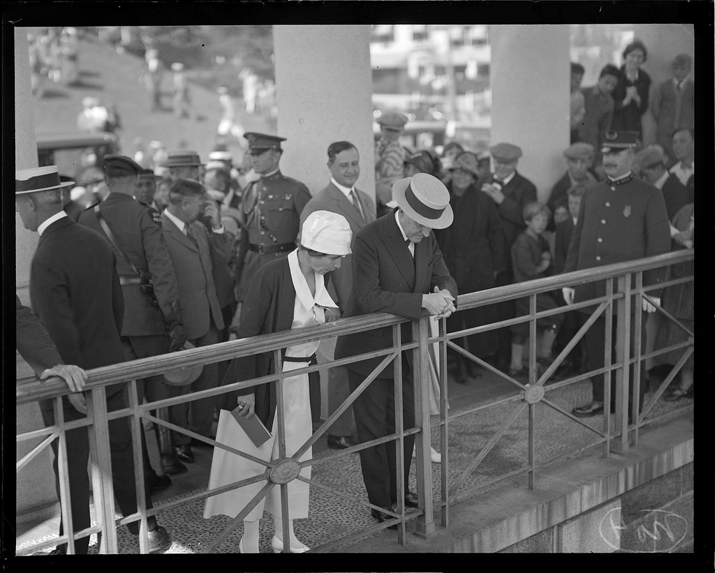 President and Mrs. Coolidge look upon Plymouth Rock. 