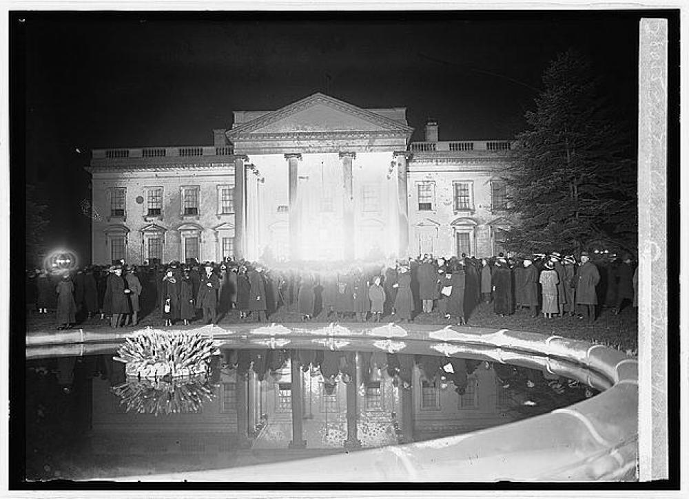 Singing Christmas carols from the North Portico at the White House, 1923.