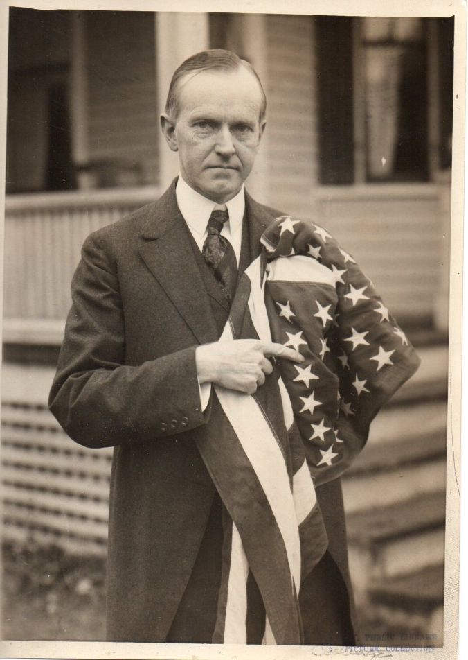 CC with flag at Massasoit home