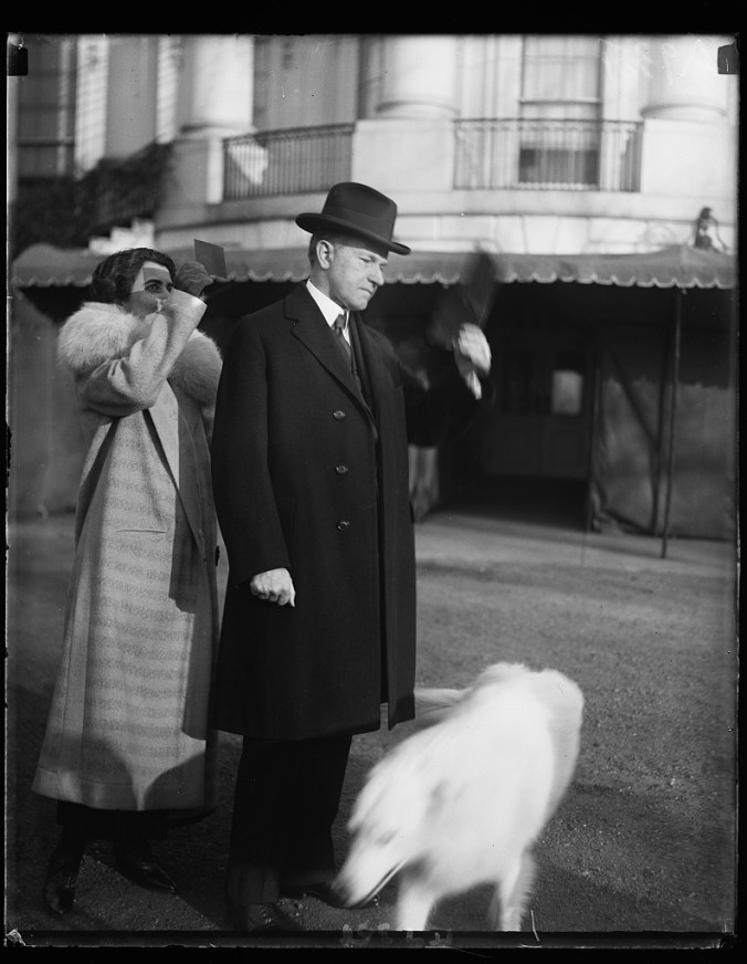 44779v Coolidges watching solar eclipse from WH lawn 1-24-25