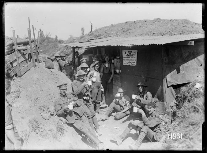 Soldiers_at_a_roadside_YMCA_canteen_near_the_Front,_World_War_I